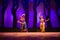 Indian Dance. Two Indian Classical odissi dancers performing at stage