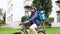 indian delivery man with bag riding bicycle