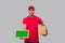 Indian Delivery Man Holding Tablet and Carpet Box. Delivery Boy Smilling Isolated