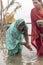 Indian devotees performing rituals on chhath puja