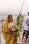 Indian devotees performing rituals on chhath puja