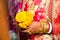 Indian Dulhan new marriage Wife hand Marigold flower .