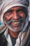 Indian elder smiling to the camera