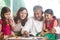 Indian family playing carrom game