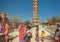 Indian family watching historical Tower of Victory inside old fortress