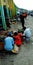 Indian farmers selling vegetables at wholesale distributor store