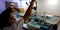 An indian female lab technician collecting test sample into the laboratory