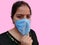 Indian female woman adjusting Face mask , Face closeup portrait view