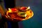 Indian Festival Diwali , lamp and marigold flower petals in pooja thali