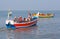 Indian fishermen catching fish for food in wooden boats