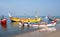 Indian fishermen catching fish for food in wooden boats in Arabian sea, Kerala, South India