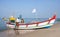 Indian fishermen catching fish for food in wooden boats in Arabian sea, Kerala, South India