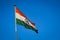 A Indian flag flying front of India get