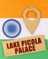 On the Indian flag, a geolocation symbol and a sign with the inscription - Lake Picola Palace