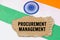 The Indian flag has a cardboard box with the inscription- PROCUREMENT MANAGEMENT