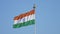 Indian Flag Tiranga means Tricolor, unfurl at height, blue sky in background 60fps Apple prores 422 CInetone.