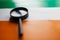 The Indian flag is visible through a magnifying glass. Spies and Observations for India India. Monitoring the state of India