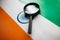 The Indian flag is visible through a magnifying glass. Spies and Observations for India India. Monitoring the state of India War