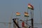 Indian flags on the masts of a fishing boat.