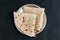 Indian flat bread Chapati, roti made of whole wheat flour and baked black background