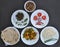 Indian Food - High angle view of mushroom soup, saag greens, salad, roti Indian bread, matar paneer mix veg and chawal rice