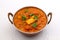 Indian Food or Indian Curry in a copper brass serving bowl