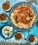 Indian food: Madras beef with basmati rice and salad on the table. horizontal view from above