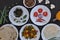 Indian Food: Overhead view of mushroom soup, saag greens, salad, roti Indian flat bread, matar paneer mix veg, chawal rice