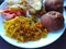 Indian food rice, bread, potato, vegetables. Goa, India.