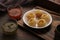 Indian Food Snacks Gol Gappe or Pani Puri or Puchka Water Balls in a White Plate