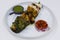Indian food speciality multi flavored tandoori chicken tikka, cream, saffron and spinach based marinated chicken cubes