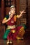 Indian girl dancing Kuchipudi dance