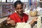 Indian girl selling flowers