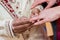 Indian groom putting ring on a bride`s hand