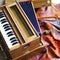 Indian harmonium, a traditional wooden keyboard instrument, close-up