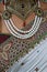Indian Hindu Brides sari, necklace jewelry and close up of chest
