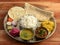 Indian Hindu Veg Thali / food platter consists variety of veggies, lentils, sweet dish, snacks etc., selective focus