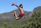 Indian kalaripayattu fighter jumping up in Kerala, South India