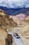 Indian lorry trucks on highway in Himalayas. Ladakh, India