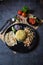 Indian lunch food ingredients pulao, paneer and roasted papad along with salad condiments