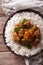 Indian Madras beef with basmati rice closeup. vertical top view