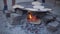 Indian making Indian Bread ( rotis )on stove in India