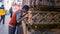 An Indian male Hindu pilgrim praying on the walls of the ancient temple complex at Kamakhya