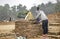 An Indian male laborer constructs and restores the Buddha\\\'s cloister at the Chetuwan Maha Vihara Temple in Savatthi, India