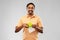 Indian man with apple and reusable canvas bag