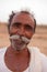 Indian man with handlebar moustache