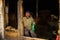 Indian man in his own shop baking `Naan` bread , Naan is a oven-baked flatbread