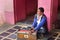 Indian man playing the Harmonium in Karni Mata Temple or Rats Temple in Deshnok. Rajasthan. India