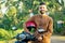 Indian man wear helmet and ready to driving explore india attractions of Goa