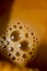 Indian masala tea with few bubbles extreme close out of focus creative photo